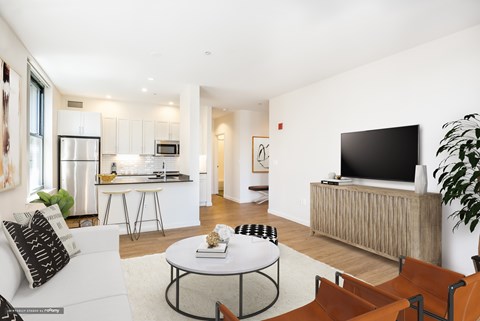 a living room with a couch and a table